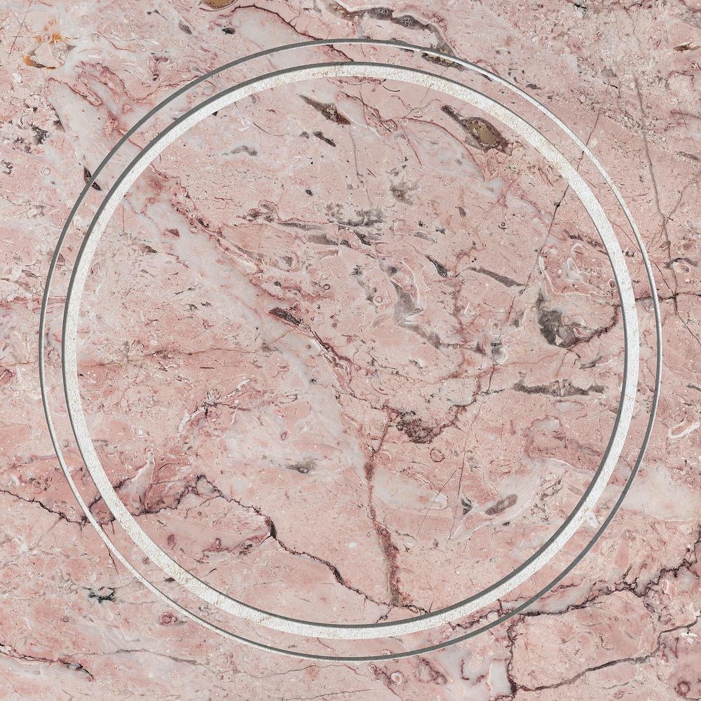 Round frame on pink marble textured background