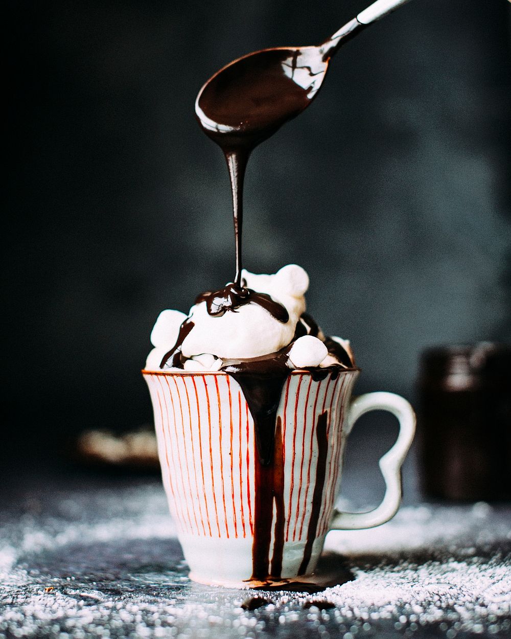 Hot chocolate with marshmallow and chocolate sauce. Original public domain image from Wikimedia Commons