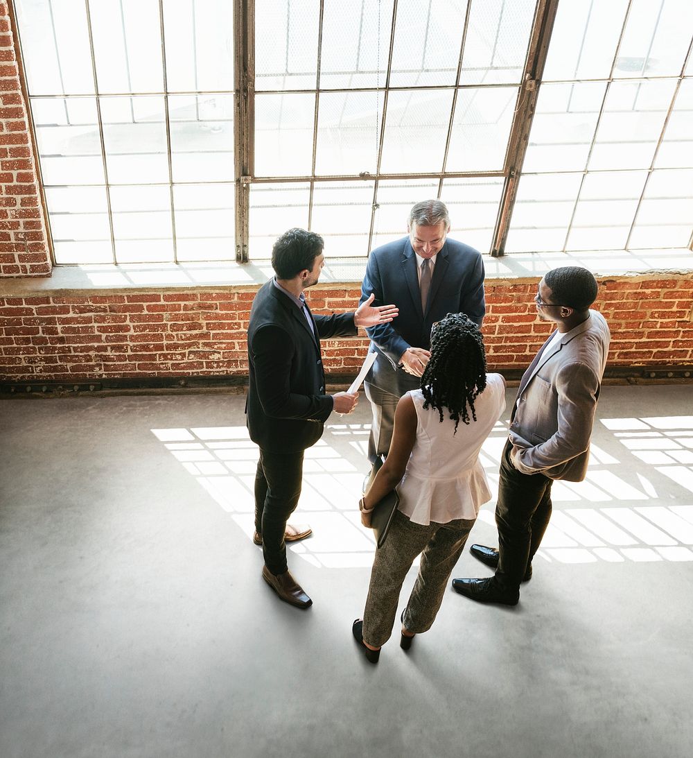 Business people making an agreement by shaking hands