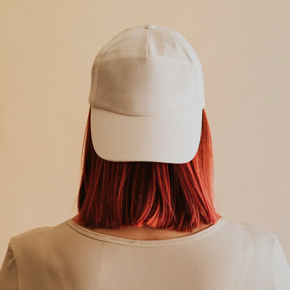 Woman wearing a white cap mockup
