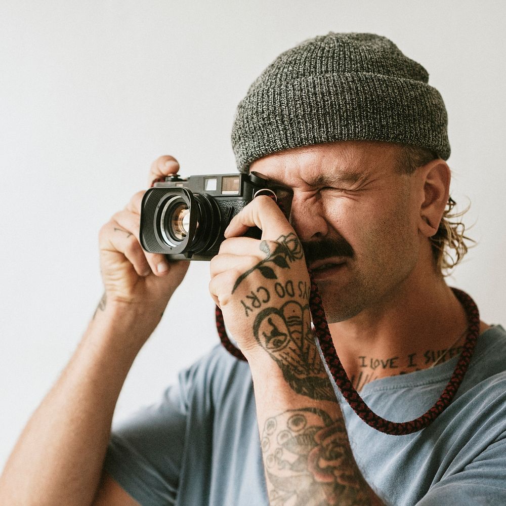 Photographer snapping with an analog camera