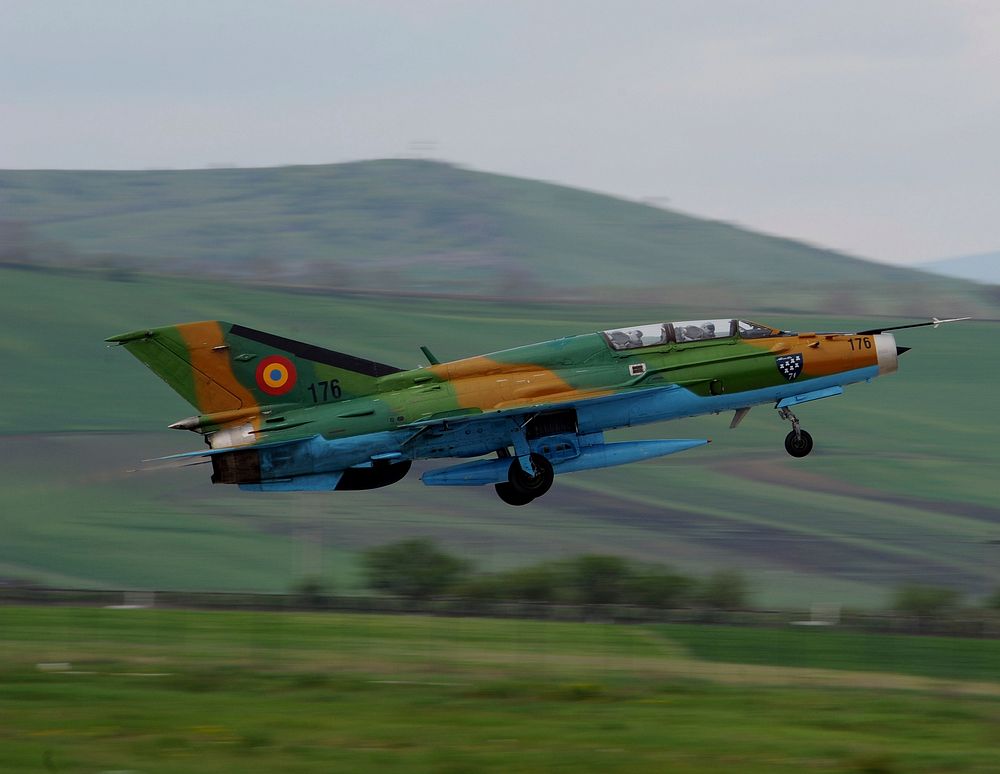 A Romanian Air Force MiG-21 Lancer aircraft takes off from Campia Turzii, Romania, April 17, 2014, during exercise Dacian…