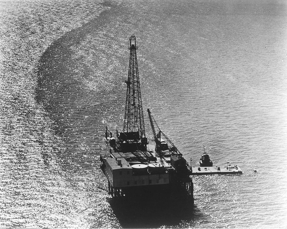 Offshore drilling is the new frontier being explored to meet the increasing demand for petroleum, c. 1970. Original public…