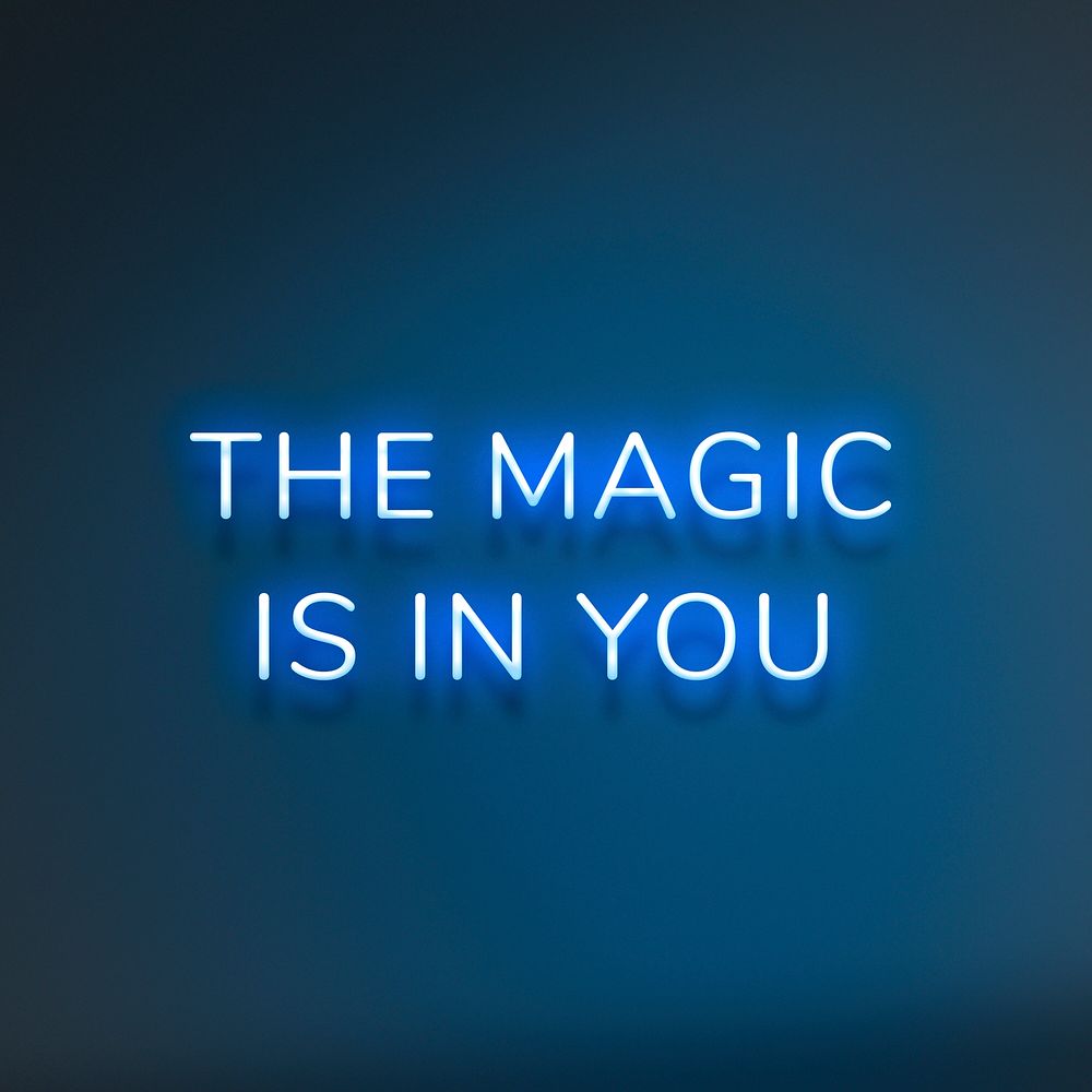 THE MAGIC IS IN YOU neon phrase typography on a blue background