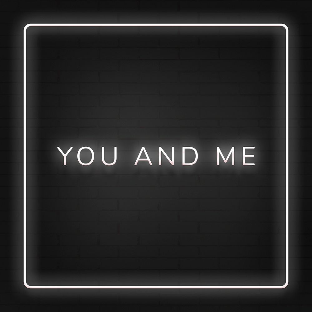 Glowing you and me neon typography on a black background