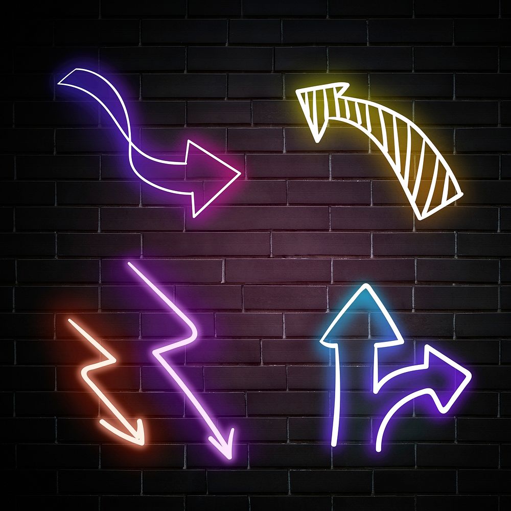 Neon arrows sign set on brick wall