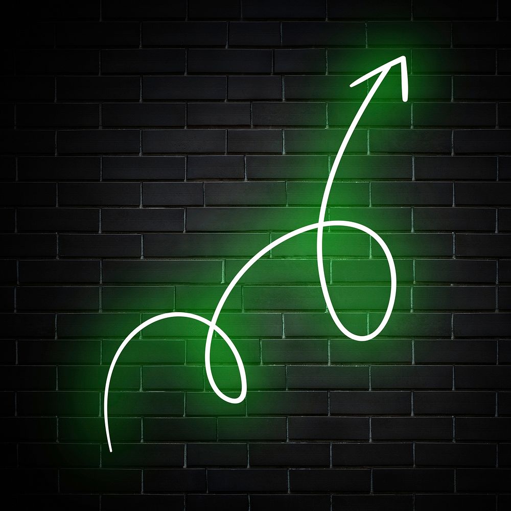 Neon green swirl arrow sign on brick wall