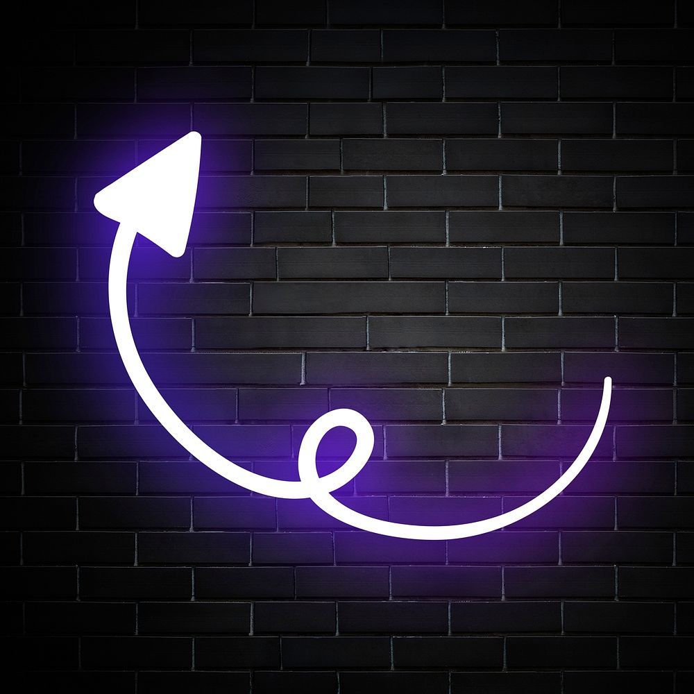 Neon purple swirl arrow sign on brick wall
