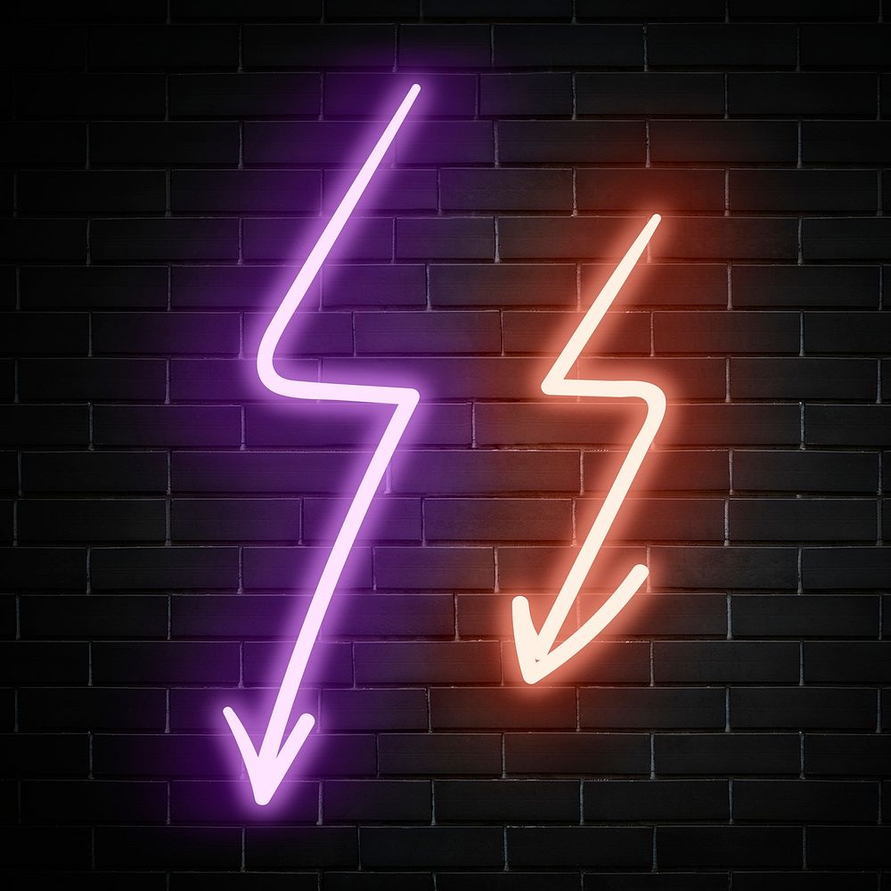 Neon pink and orange zigzag arrows sign on brick wall