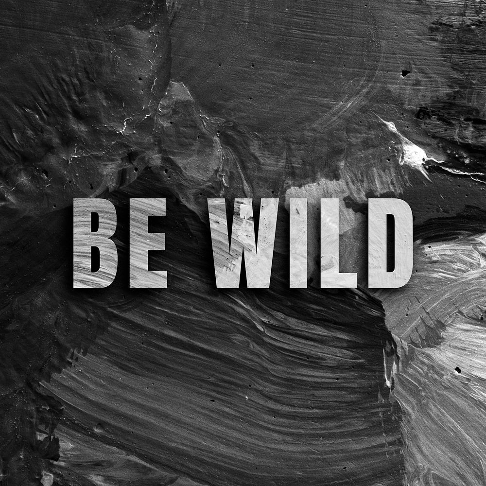 Be wild uppercase letters typography on brush stroke background