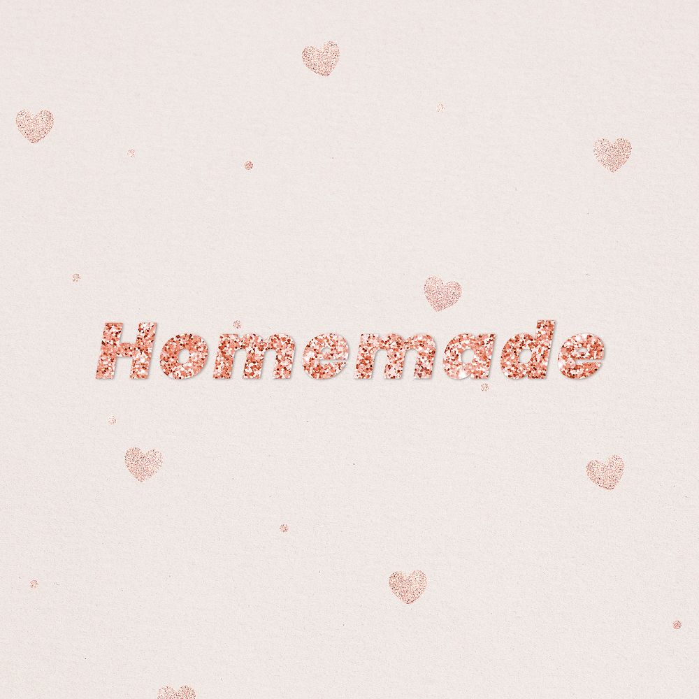Glittery homemade typography on heart patterned background