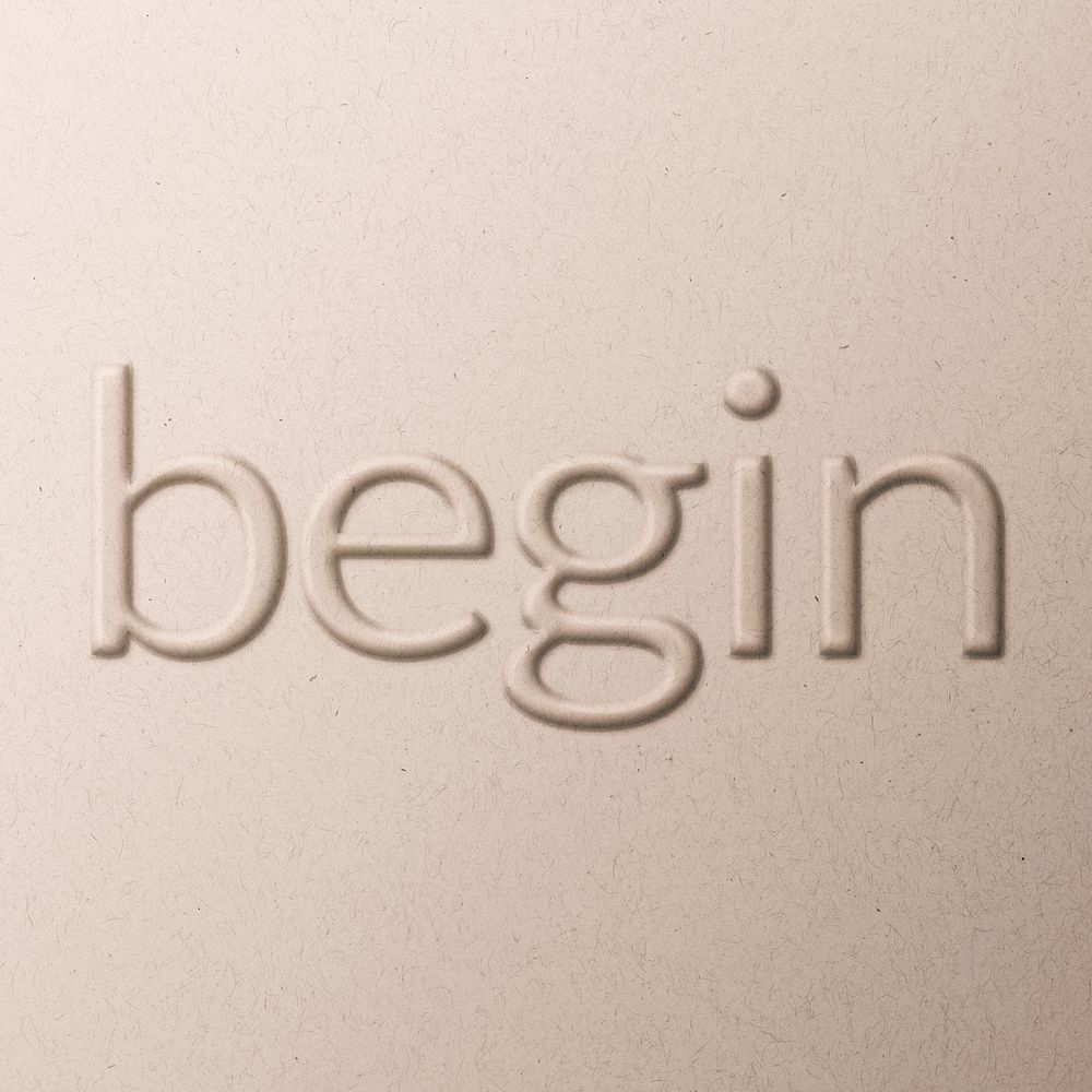 Word begin embossed typography on paper texture