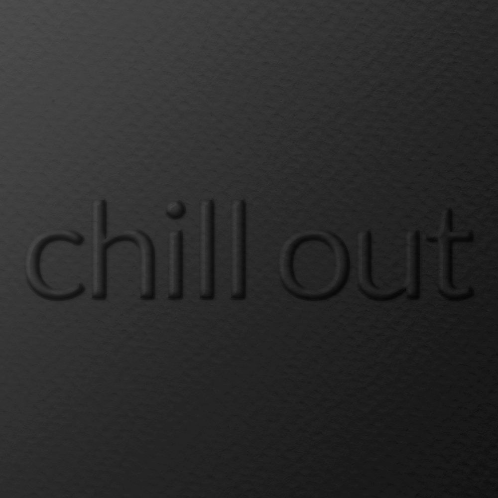Chill out phrase embossed typography on paper texture