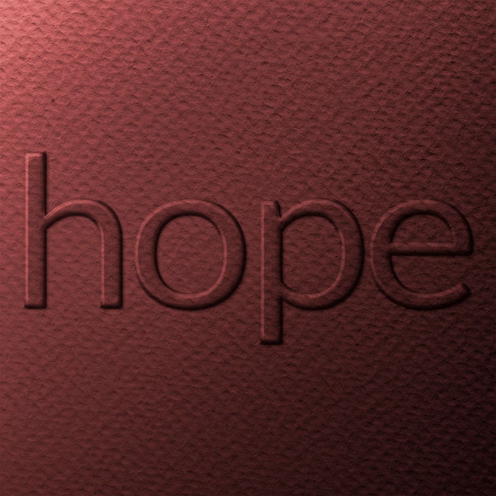 Text hope embossed typography on paper texture