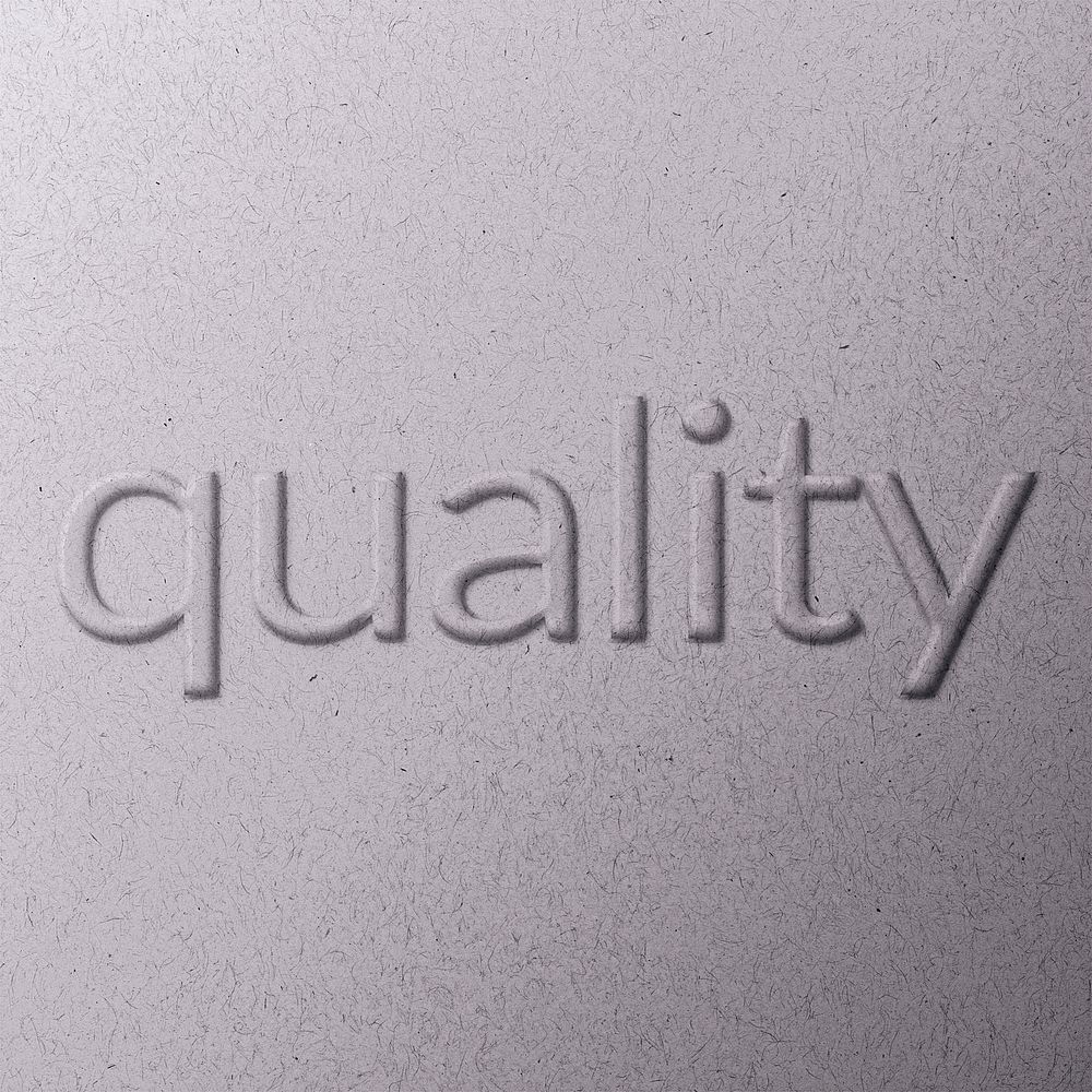 Quality word emboss typography on paper texture