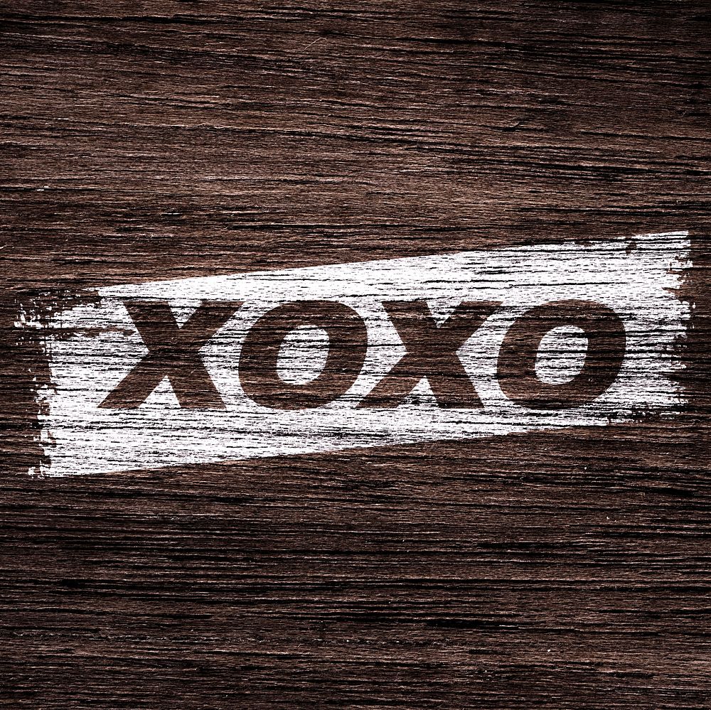Bold italic XOXO text wood texture