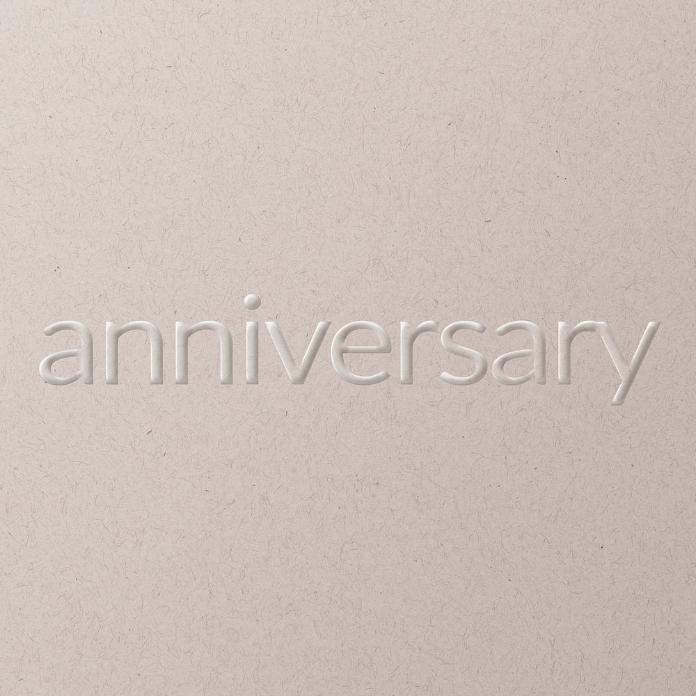 Anniversary embossed text white paper background