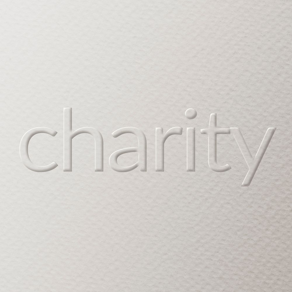 Charity embossed text white paper background