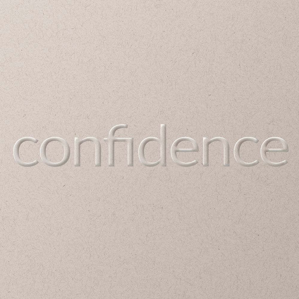 Confidence embossed text white paper background