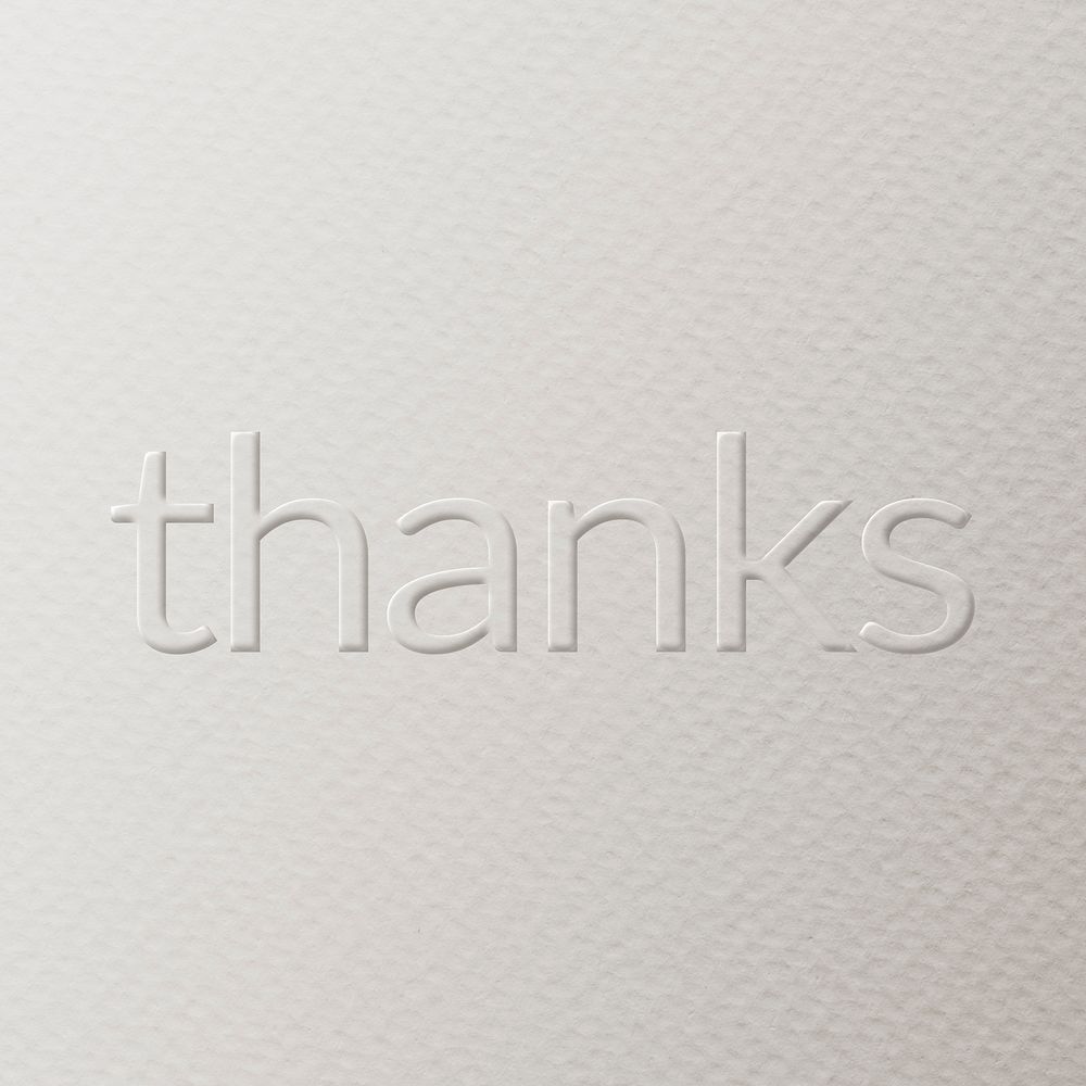 Thanks embossed text white paper background
