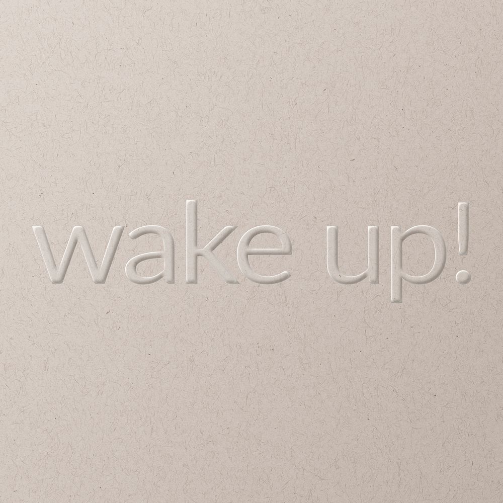 Wake up! embossed text white paper background