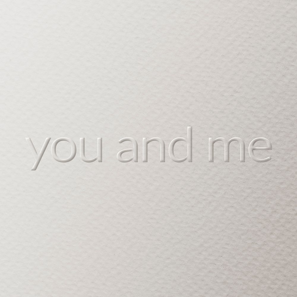 You and me embossed text white paper background