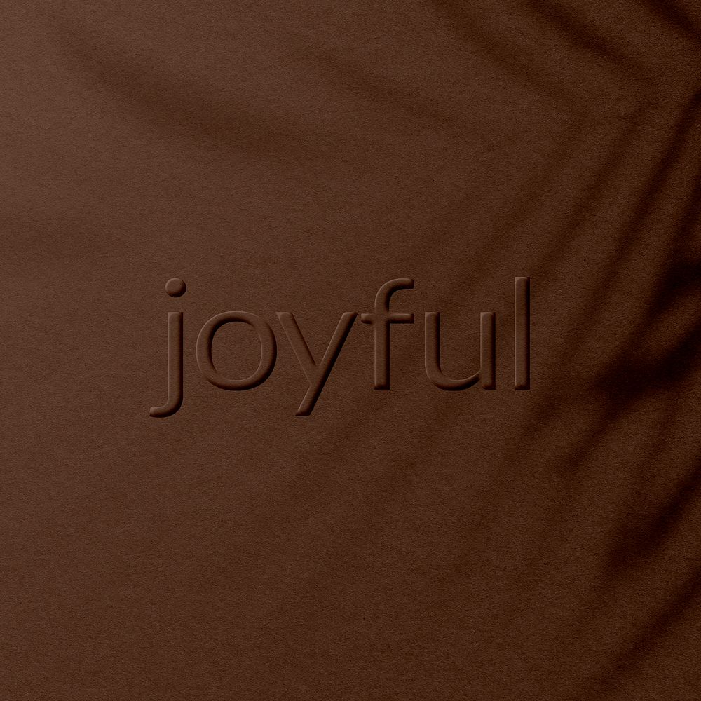 Embossed joyful text plant shadow textured backdrop typography