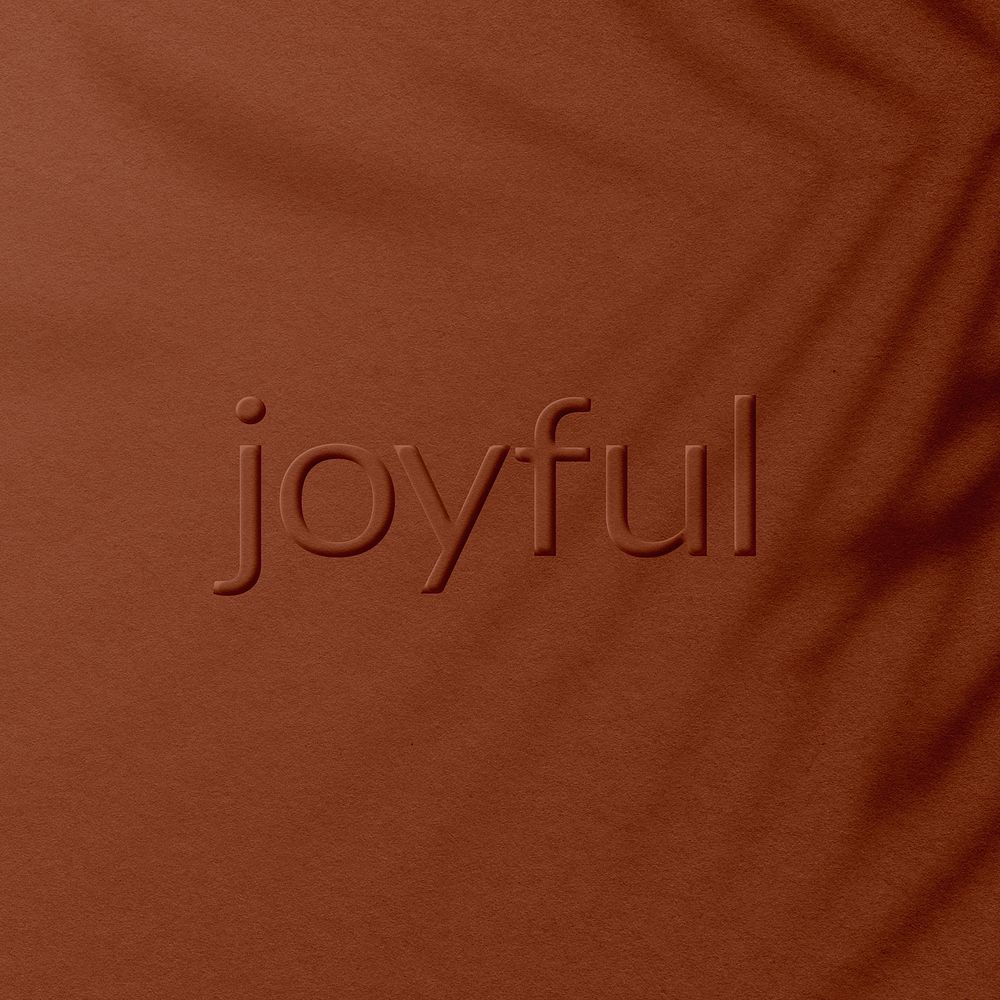 Embossed joyful text plant shadow textured backdrop typography