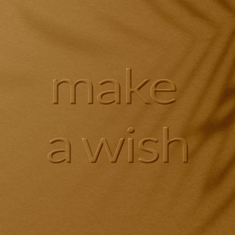 Mustard textured background message embossed make a wish typography