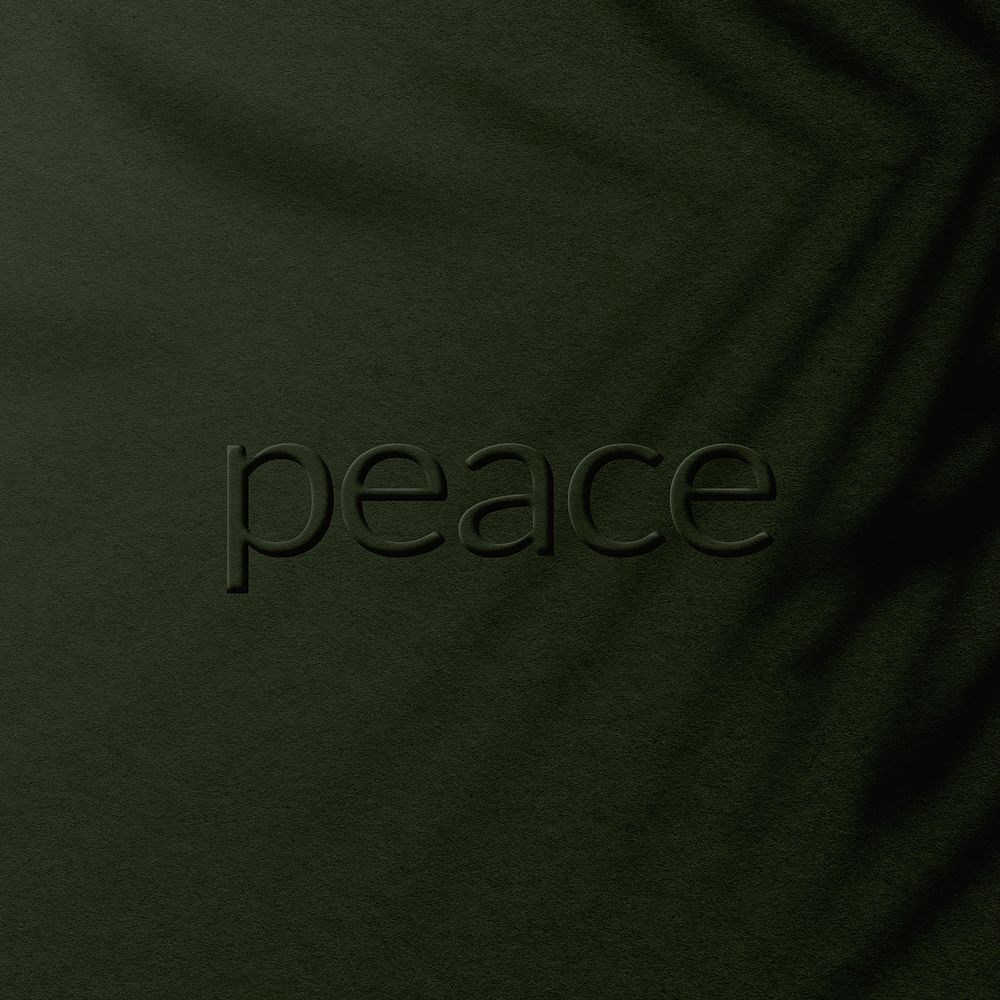 Plant shadow peace text green concrete textured 