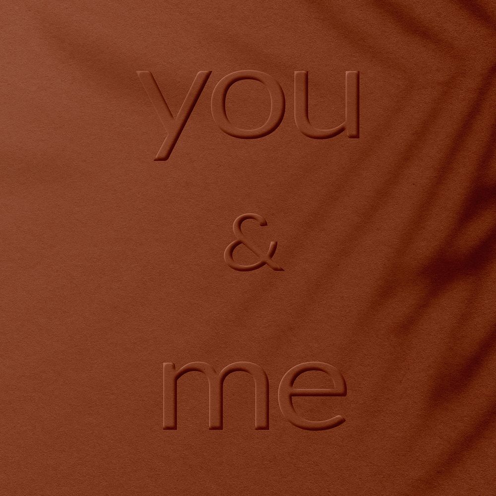 Brick red concrete texture embossed you and me message typography