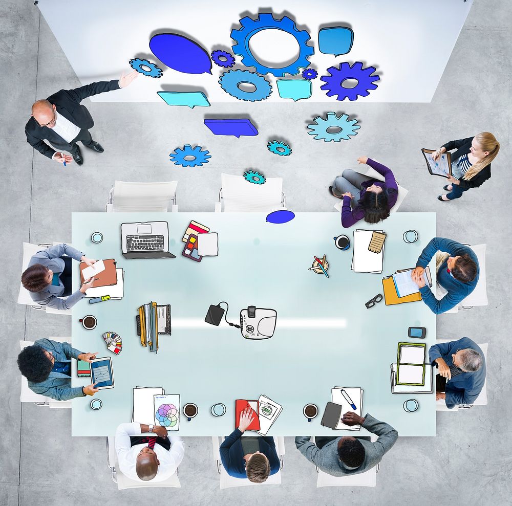 Group of People in a Meeting and Gear Symbol