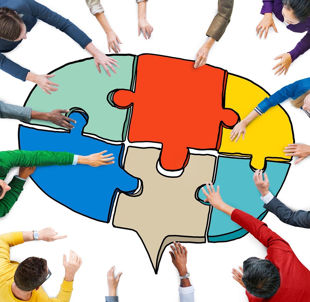 Business People Forming a Jigsaw Puzzle Speech Bubble
