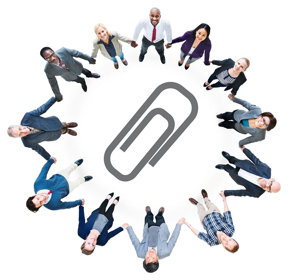 Business People Holding Hands and Paper Clip Symbol