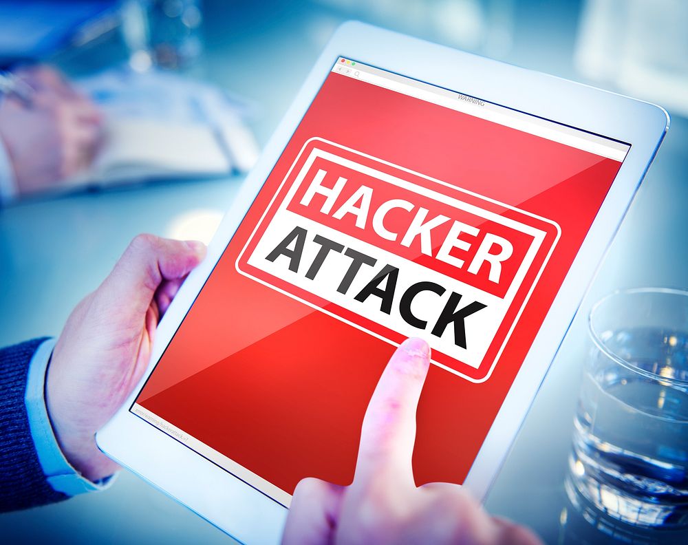 Hands Holding Digital Tablet Hacker Attack