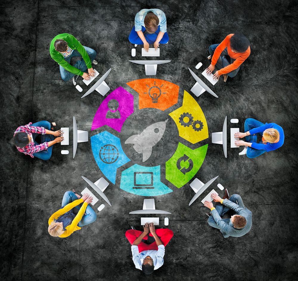 Group of People in Circle with Technology Concept
