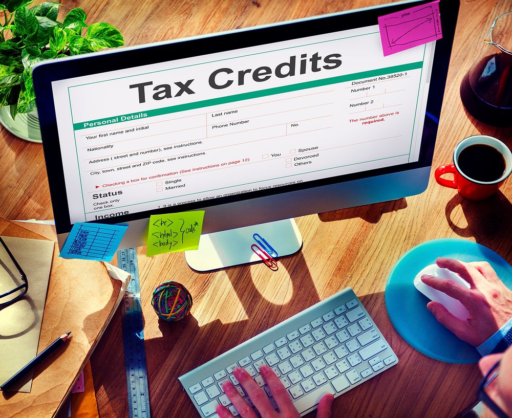 Tax Credits Claim Return Deduction Refund Concept