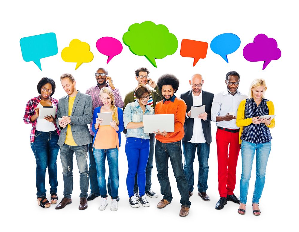 Group Of Multi-Ethnic Group Of People Holding Electronic Devices To Social Network And Colorful Speech Bubbles Above