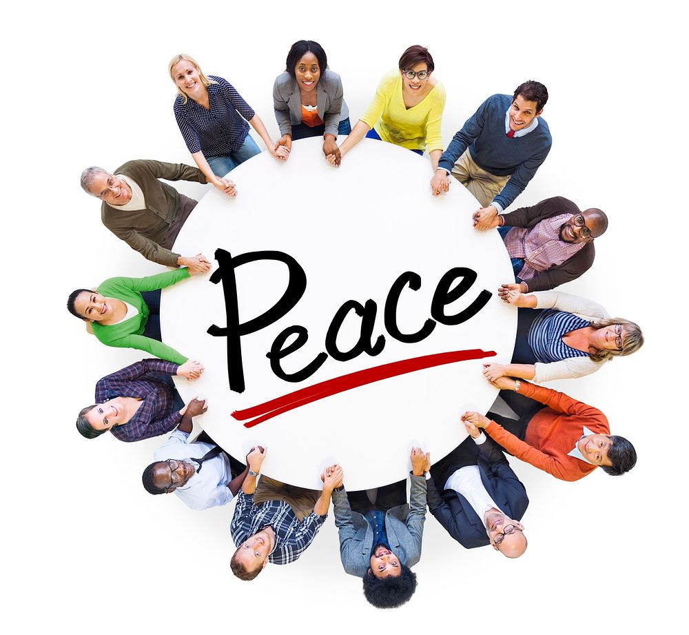 Group of People Holding Hands Around Letter Peace