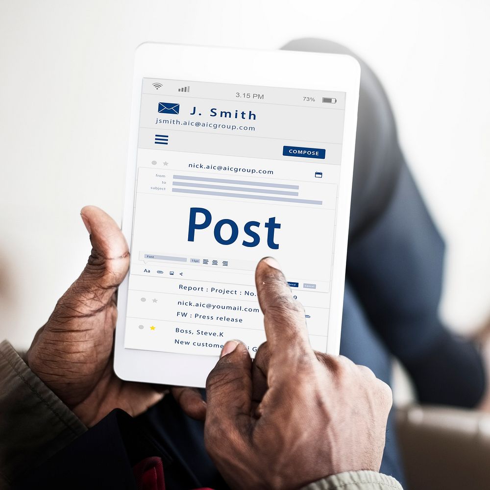 Hands composing an email on a digital device