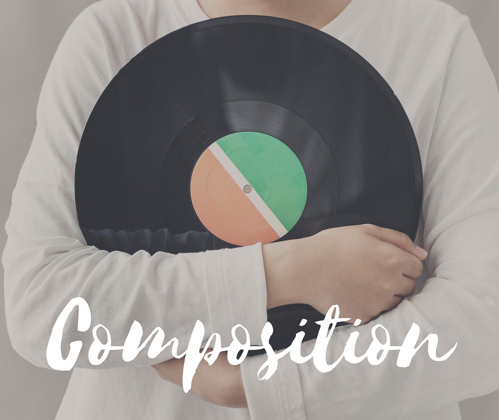 Female Holding Vinyl Music Graphic Concept