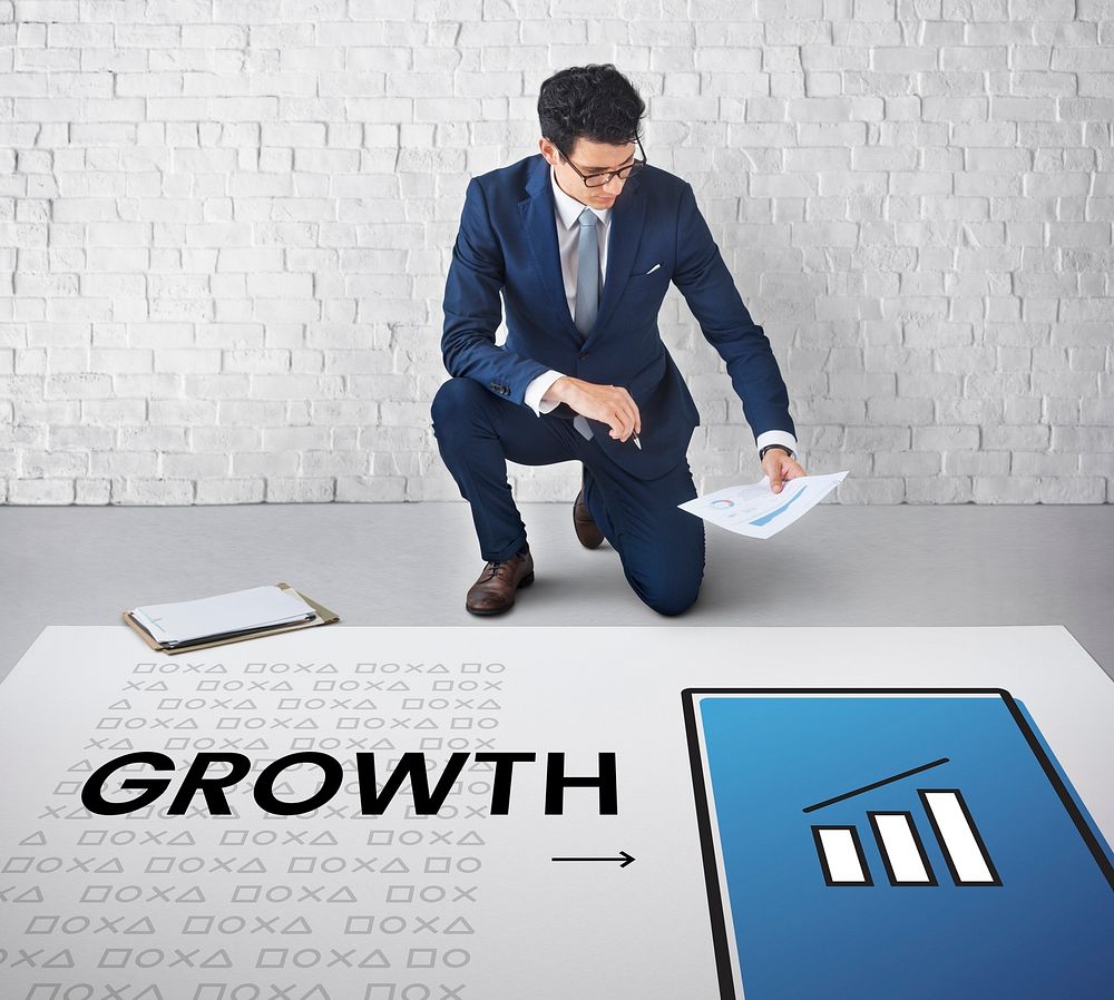 Man working on banner network graphic overlay on floor