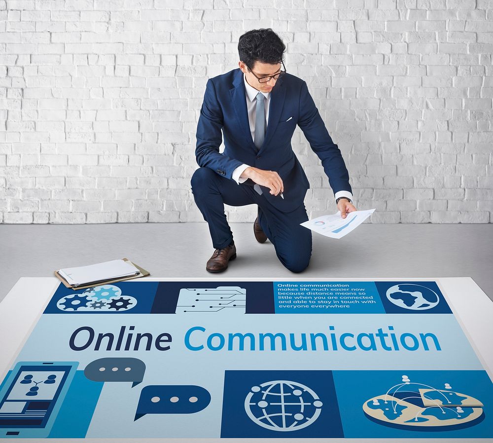 Man working on banner network graphic overlay on floor