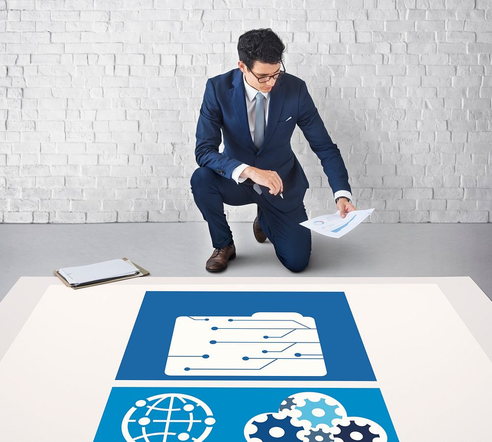 Man working on billboard network graphic overlay on floor