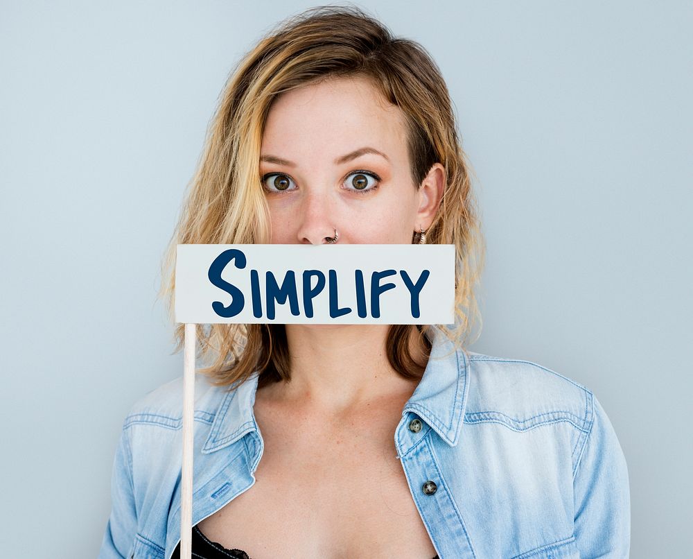 Adult Woman Showing Simplify Word Sign