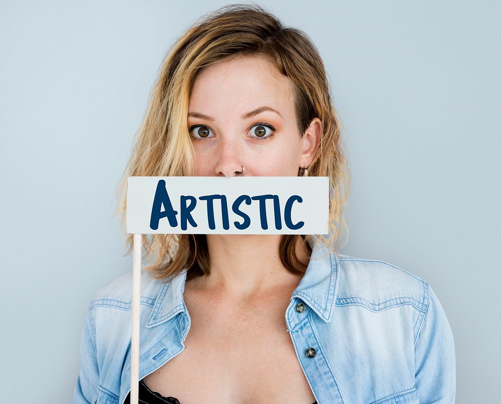 Woman Showing Artistic Sign Studio Portrait