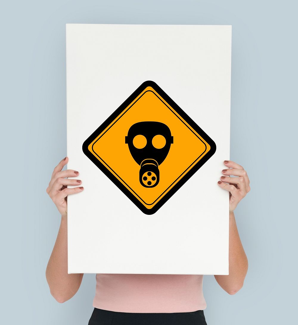Studio Shoot Holding Banner with Radioactivity Protection Mask Sign