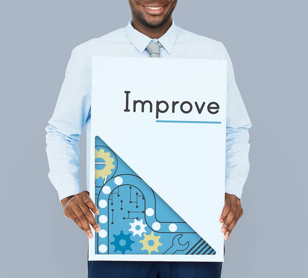 African businessman show the improve word on banner