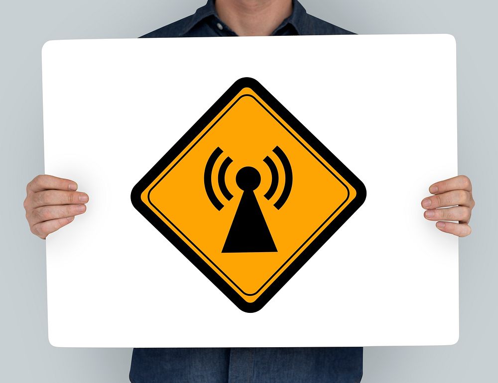 Studio Shoot Holding Banner with Signal Network Sign