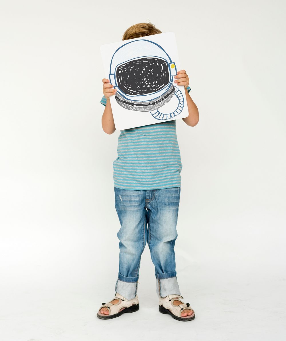 Child with a drawing of astronaut helmet